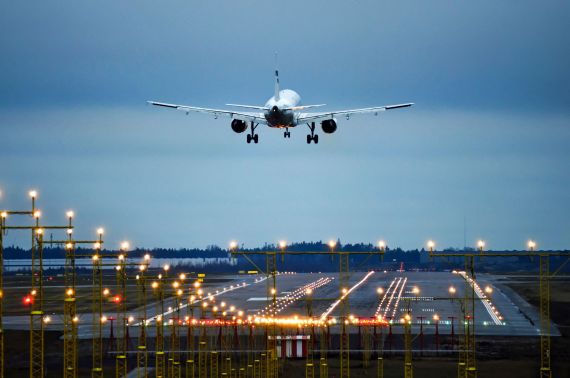 Airplane landing to runway at airport