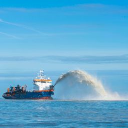 Coastal protection: rainbowing trailing suction hopper dredger