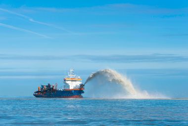 Coastal protection: rainbowing trailing suction hopper dredger